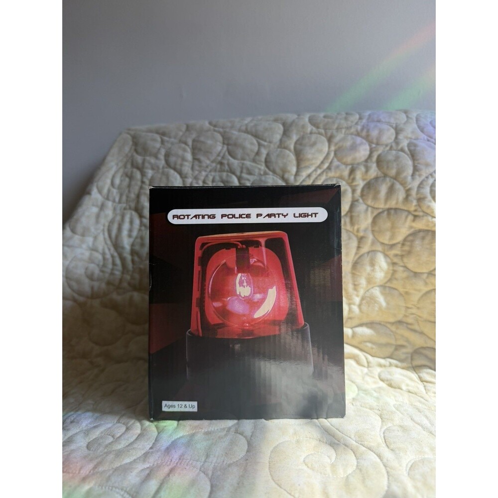 7 Inch Red police Party Light Rotating.  Open box but never been used